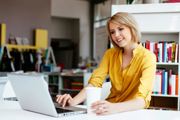 Woman managing finances on laptop