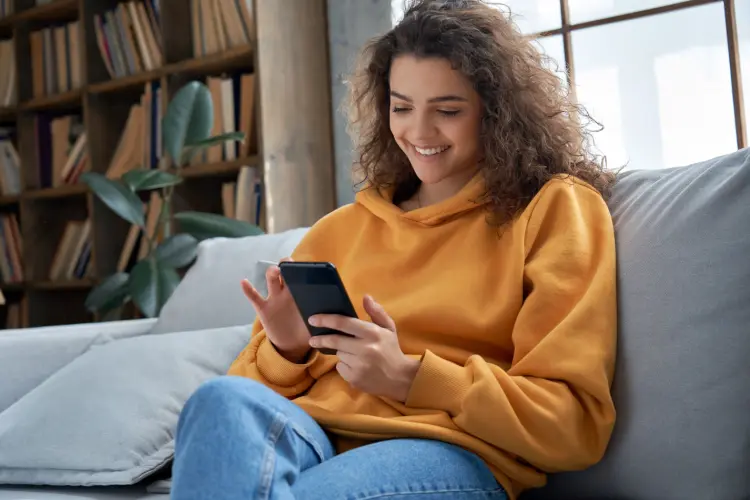 Woman checking loan options on phone