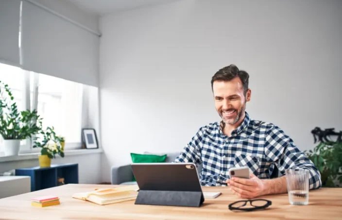 Man reviewing bad credit loan options on a tablet